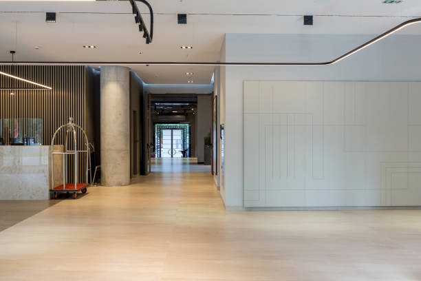 istock Interior of a hotel lobby with reception desks 1275799132