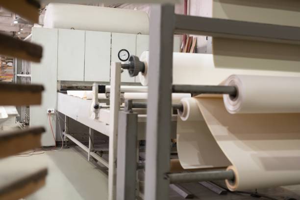 istock Paper rolls on industrial factory 1275799271