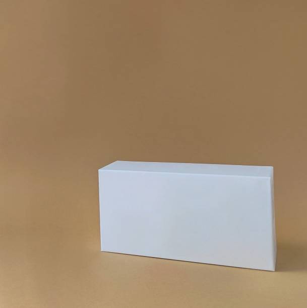 istock White box on a pastel background for mock-up, front view. Trendy product stand display showcase for cosmetic products and goods. Copy space. 1275801944