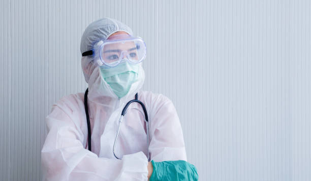 istock woman Doctor with face mask 1275804437