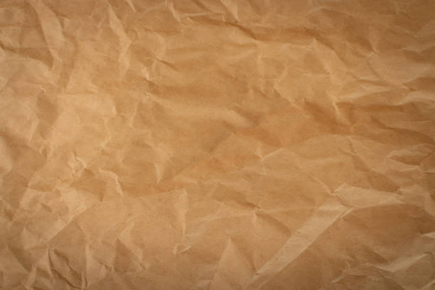 istock Kraft Paper Texture. Natural Brown Vintage Paper Background 1275804844