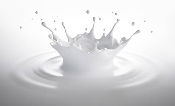 Milk splash Isolated Milk Crown Splash on white Background splash crown stock pictures, royalty-free photos & images