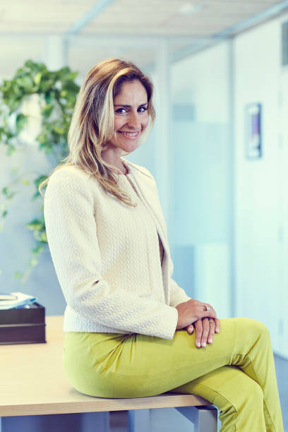 istock Confident Business woman at office 1275807053