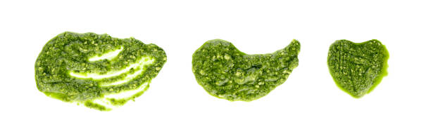 istock Pesto sauce spread or blob isolated on white background 1275809088