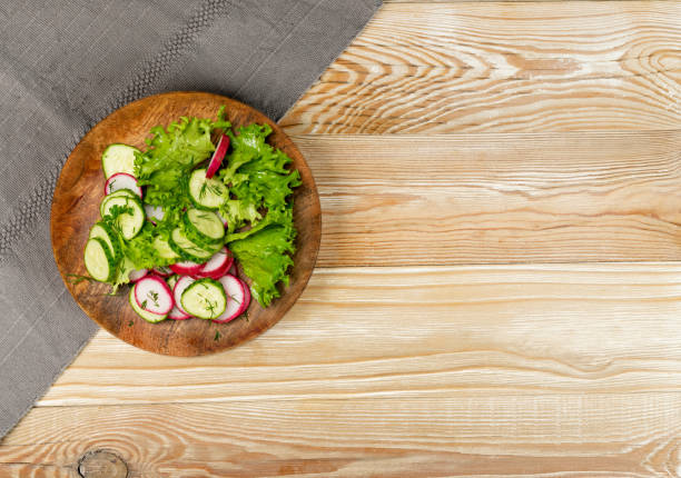 istock Spring Radish Salad with Cucumber or Simple Rustic Salat 1275809142