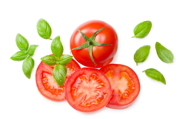 istock fresh tomato slices isolated on white background. top view 1275810661