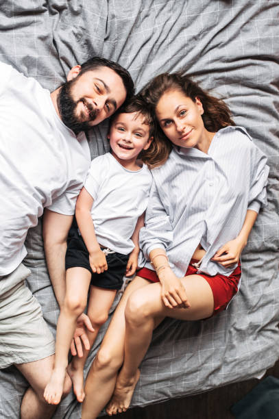 istock Young family spends time together at home 1275811291