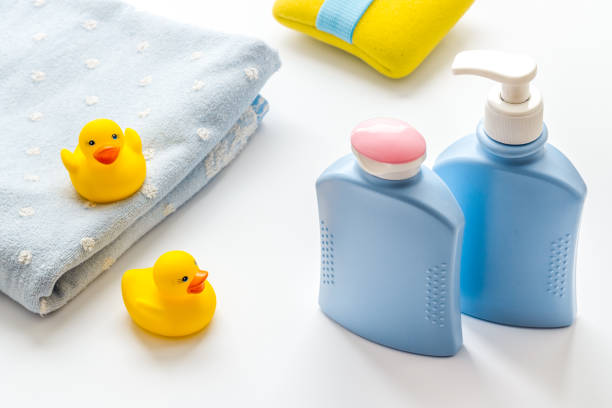 istock Baby accessories for bath with care products and rubber duck 1275813784