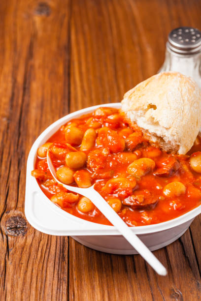 istock Baked beans in tomato sauce served in plastic cups. 1275820340