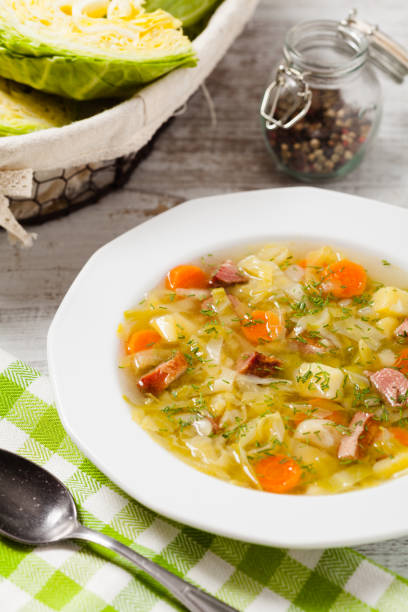 istock Homemade cabbage soup, cooked on smoked ribs. 1275820554