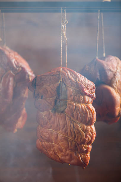 istock Smoked pork in a homemade smokehouse 1275820573