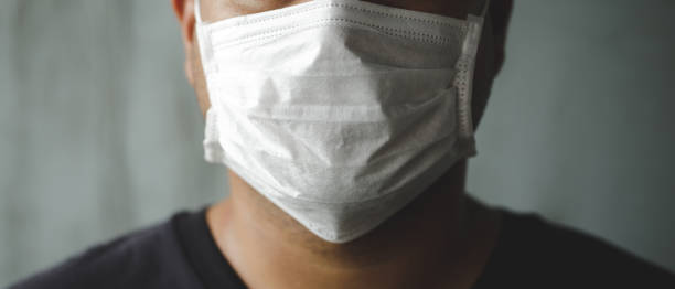 istock A man wearing a mask To prevent COVID 19 1275820982