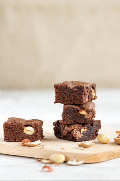 istock Pieces of chocolate brownie with peanuts 1275821124