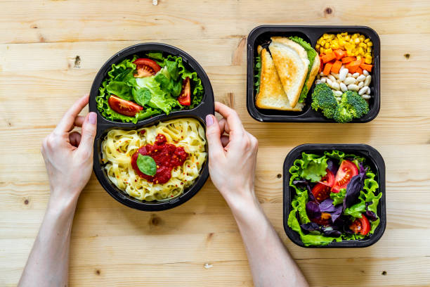 istock Food delivery background. Take away meal in boxes. Top view 1275821834
