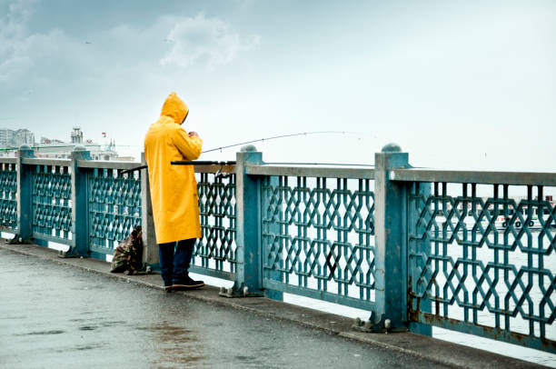 Man fishing on the bridge