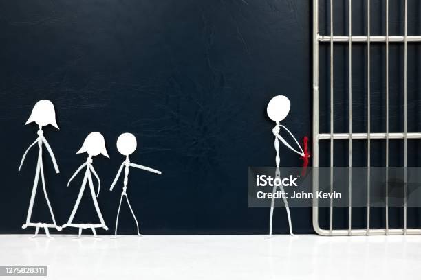 Stick Figure Father Handcuffed Tied With Red Rope Going To A Jail Prison With Sad Family On The Side In Dark Background Husband Guilty Of Crime Imprisonment Capture And Broken Family Concept Stock Photo - Download Image Now