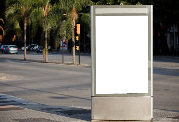 istock Mockup blank advertising signs and template or light posters with space to copy text or media message and content, blank shadow posters with screen on city wall background 1275828986