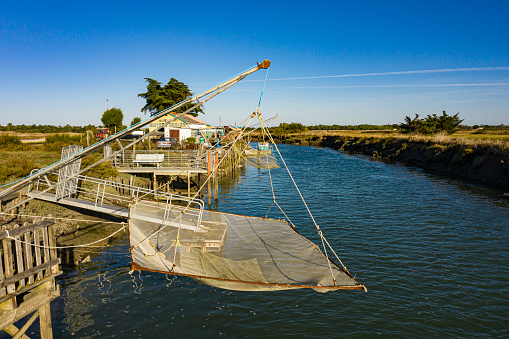 Oleron France: September 2020 Traditional fishermen huts in the canal of Perrotine in the island of Oleron.