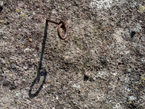 istock Old climbing bolt used in dedo de deus conquer at 1912 1275833310