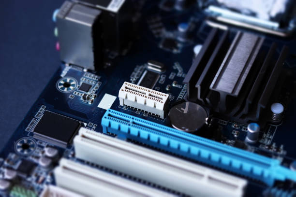 istock Computer motherboard closeup in tilt shift style. Computer equipment repair, assembly and upgrade of system units 1275833724