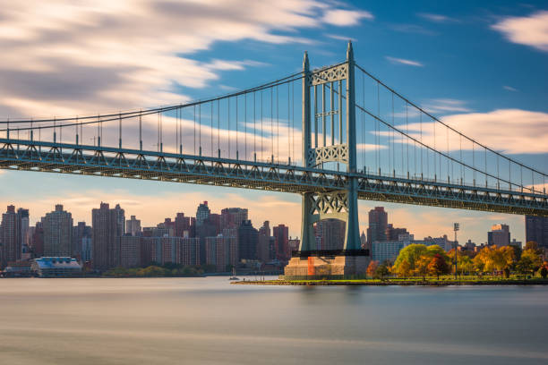 Robert F. Kennedy Bridge Robert F. Kennedy Bridge in New York City spanning the East River from Randalls Island to Queens. harlem park stock pictures, royalty-free photos & images
