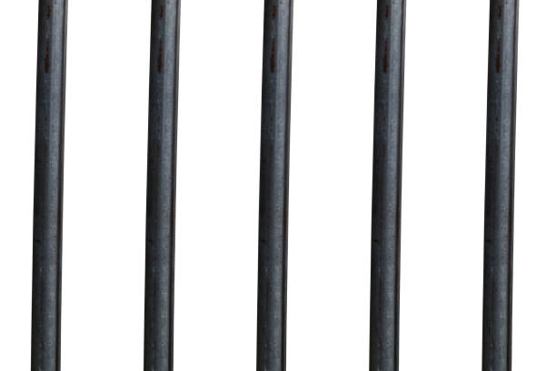 istock metal prison bars on white backgrounds 1275836819