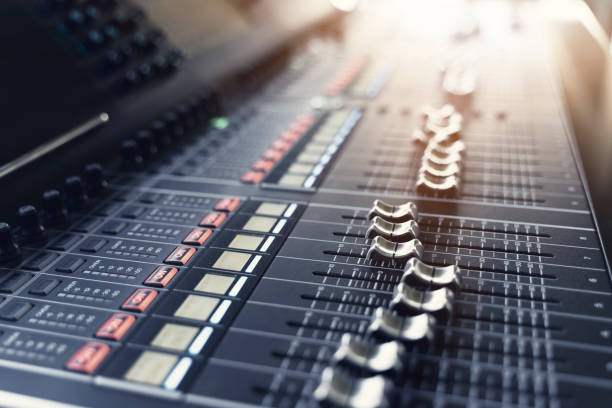 istock professional concert mixing console is equipped with high-precision and long-stroke faders. Close-up 1275836876