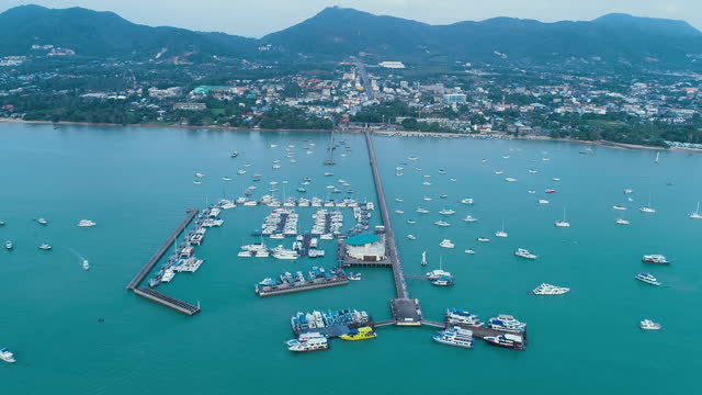 Aerial view of the Pattaya city with the tourist on the dock