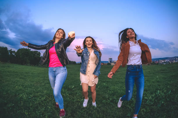 istock Three teenage girls having fun 1275838399