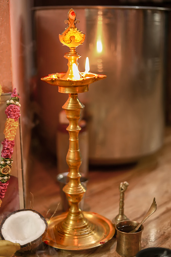 Traditional south indian brass oil lamp 'Nilavilakku '. During events like housewarming,