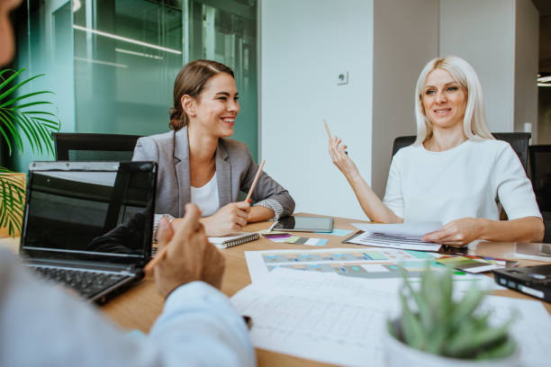 istock Business people discussing something with colleagues 1275839168