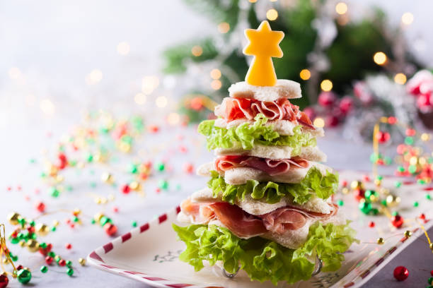 istock Christmas tree from toasted bread, lettuce, ham and cheese 1275839231