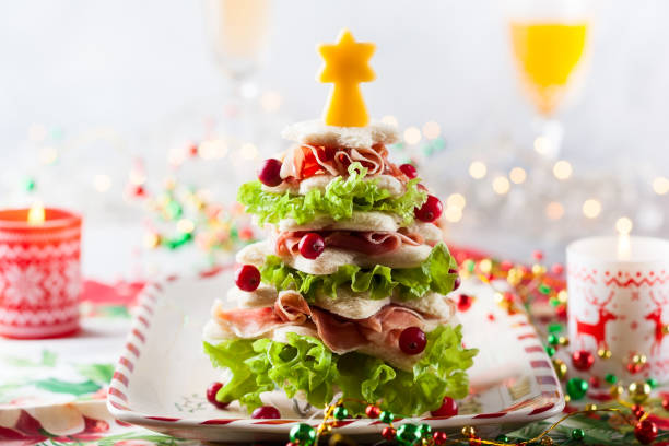 istock Christmas tree from toasted bread, lettuce, ham and cheese 1275839236