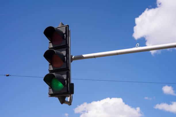 istock Low Angle View Of Traffic Stoplight With Green Signal Light 1275844278