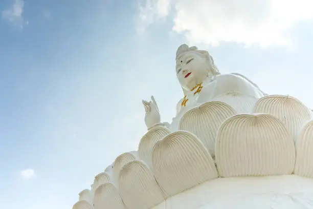 The Goddess of Mercy, known as Quan Yin or Guan Yin Statue at Wat Hyua Pla Kang temple in Chiang Rai, Thailand.
