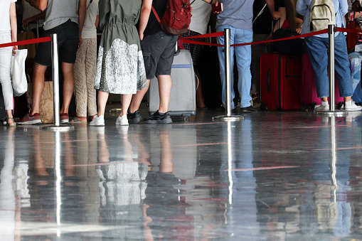 Passengers during registration to board the plane