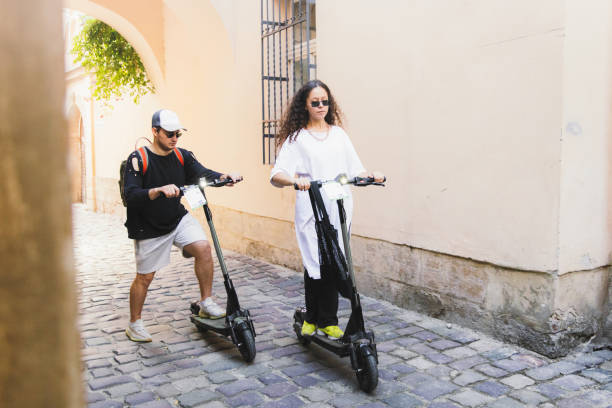 istock Young happy couple have a date riding motor scooter 1275844833