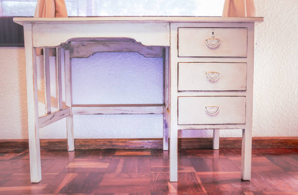 istock Old White wooden work desk, with three draws, inside a bedroom, South Africa 1275846191