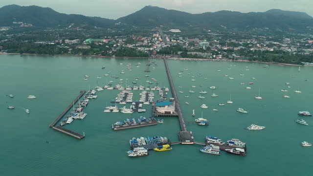 Aerial view of the Pattaya city with the tourist on the dock