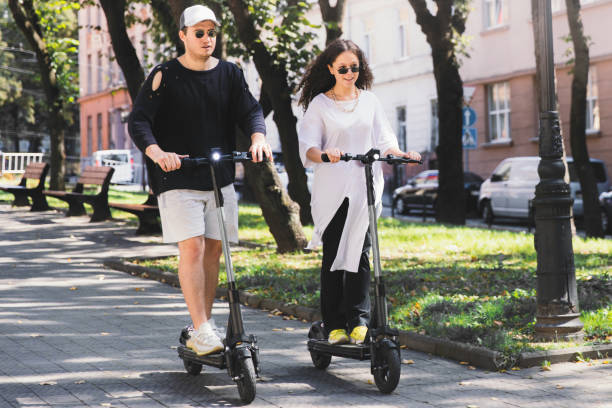 istock Young happy couple have a date riding motor scooter 1275847622
