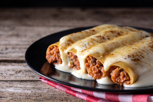 istock Delicious meat cannelloni pasta 1275848643