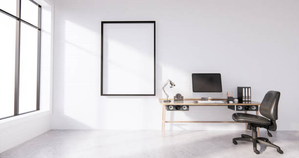 istock The interior Computer and office tools on mini desk in white concrete floor and white brick wall design. 3D rendering 1275852357