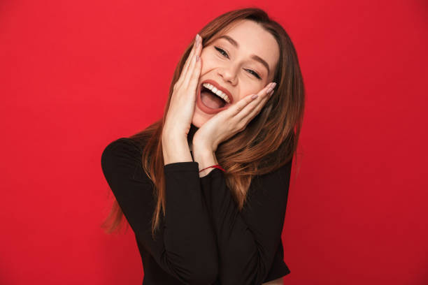istock Screaming excited young woman 1275852358
