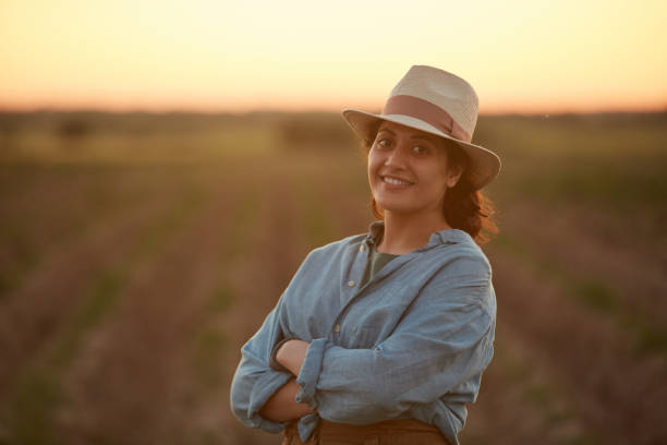 Smiling Female Farmer in Field