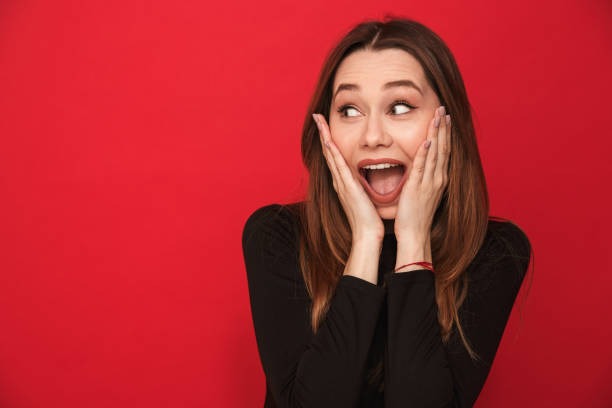 istock Screaming excited young woman 1275852816