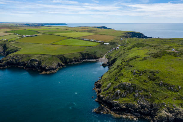 istock Aerial view of a small bay surrounded by cliffs 1275853131