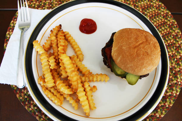 istock Hamburger and French fries 1275854671