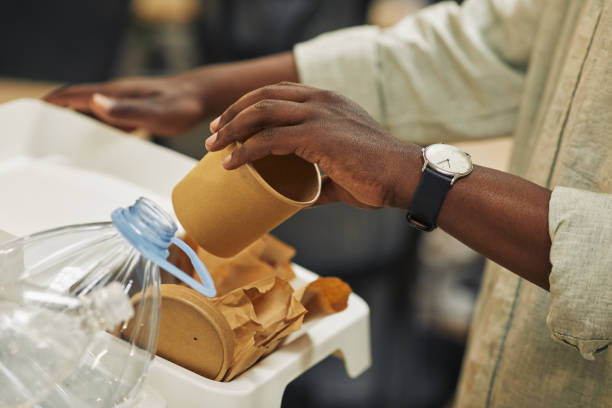 istock African Man Recycling Paper Cup Close Up 1275858286