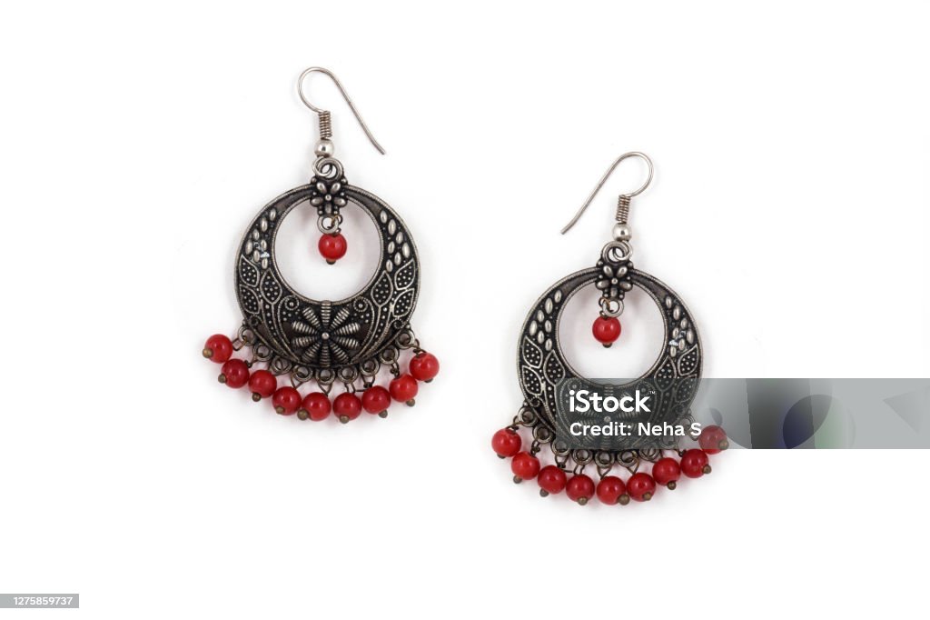 Silver Isolated Earring Ethnic Indian Style, Bohemian Jewellery, Stylish Silver Oxidized Earrings, red Beads Earrings, Jhumka Earrings, Jhumki Earrings, Dangle Drop Stud Earrings Earring Stock Photo