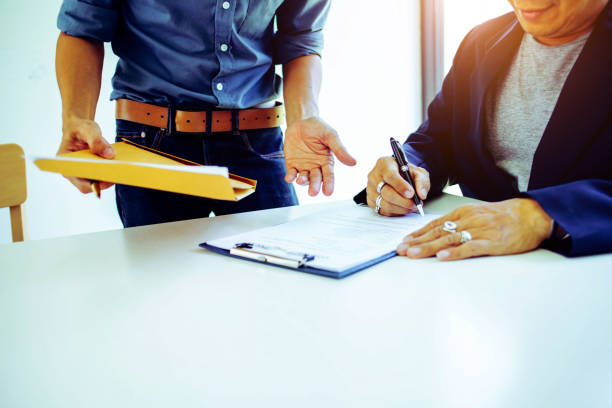 istock business team hands searching for data on mobile phone  with analyzing charts at his workplace. 1275860559